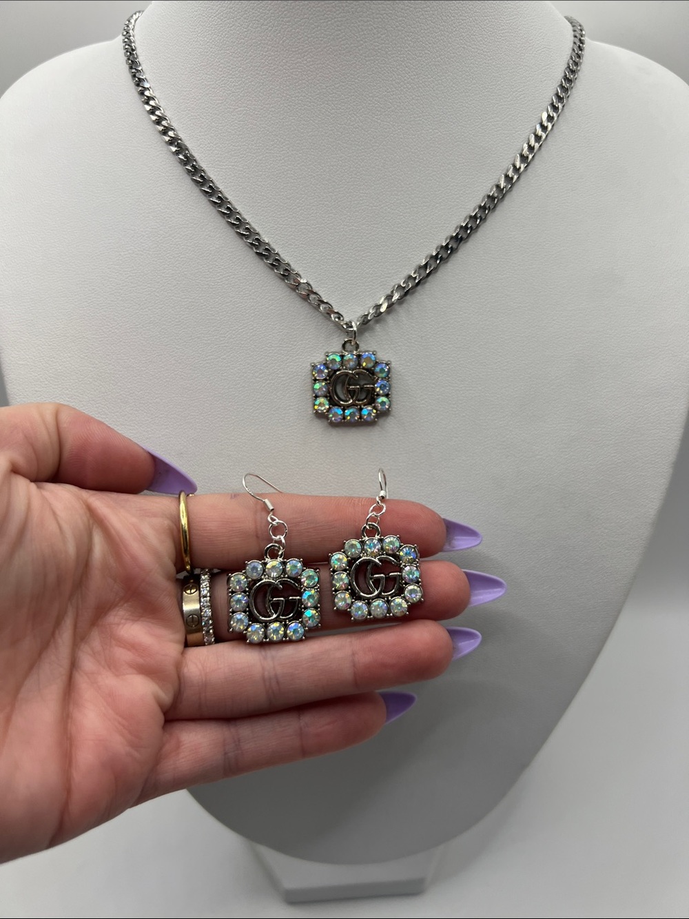1469. Silver Tone Necklace & Earrings Set 18” with AB crystal stamped charms